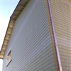 Fassadenschiefer Clinar mit einem andersfarbigen Streifen geschmückt