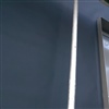 Fassadendämmung eingepackt mit einer UV-beständigen, hochwertigen Fassadenbahn als wasserführende Schicht im Hintergrund